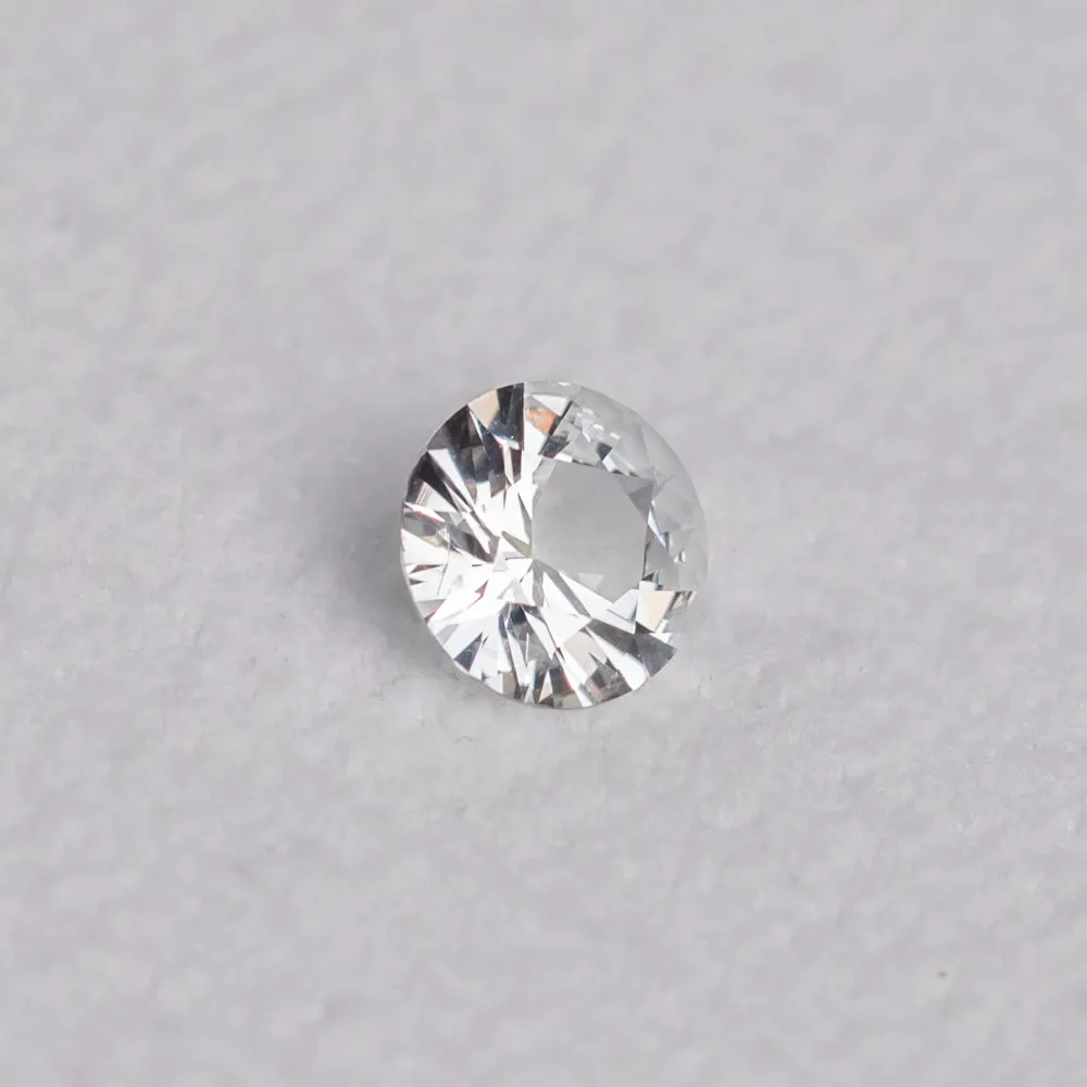 0.96CT ROUND BRILLIANT SRI LANKAN SAPPHIRE, WHITE GREY, 6.3MM