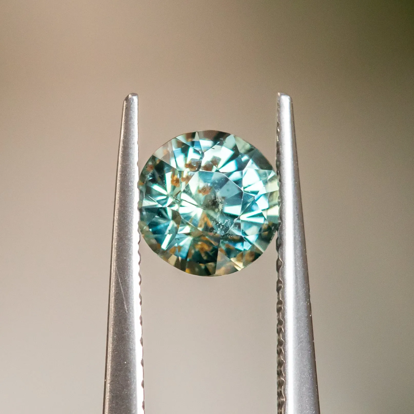 1.21CT ROUND BRILLIANT TANZANIA SAPPHIRE, TEAL SPRING GREEN, 5.99X4.39MM, UNTREATED