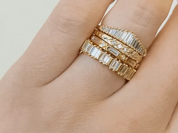 Gold Bridge Eternity Ring with Tapered Baguette and Trapeze-Cut Diamonds